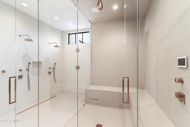 bathroom with a stall shower, tile patterned flooring, and recessed lighting