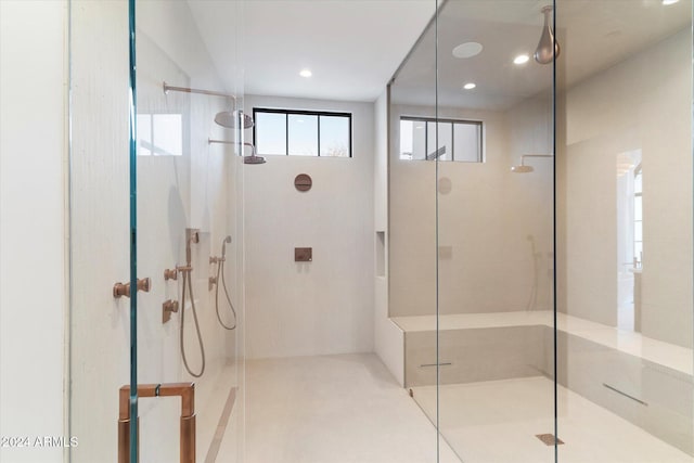 bathroom with an enclosed shower