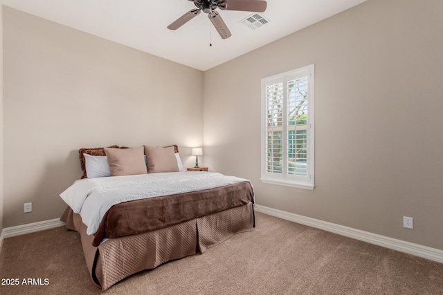 bedroom featuring carpet, baseboards, visible vents, and ceiling fan