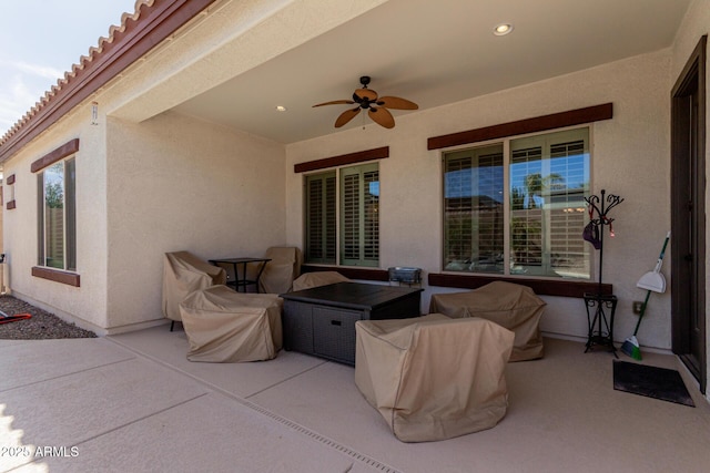 view of patio / terrace with ceiling fan