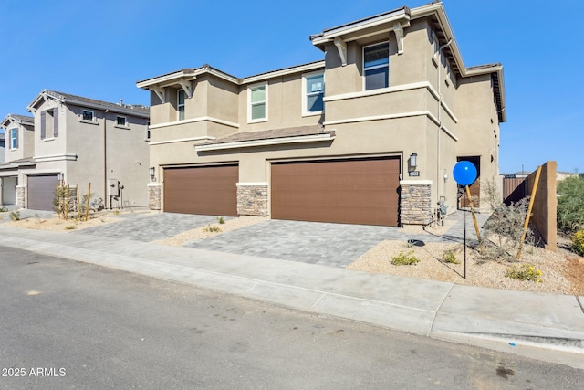 view of front of property with a garage