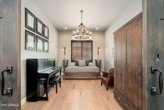 11070 E Bent Tree Dr, Scottsdale, AZ 85262 - bedroom featuring light wood-type flooring, a chandelier, and recessed lighting