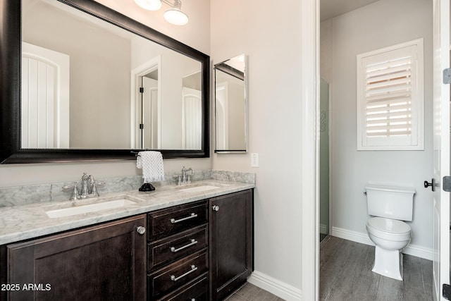 11070 E Bent Tree Dr, Scottsdale, AZ 85262 - bathroom featuring double vanity, wood finished floors, and a shower