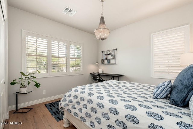 11070 E Bent Tree Dr, Scottsdale, AZ 85262 - bedroom featuring wood finished floors and baseboards