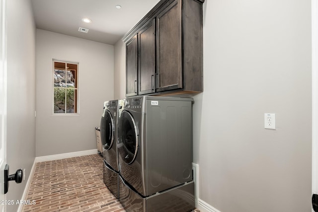 11070 E Bent Tree Dr, Scottsdale, AZ 85262 - laundry room featuring independent washer and dryer, cabinet space, brick patterned floors, and recessed lighting