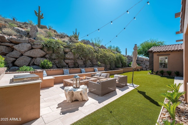 11070 E Bent Tree Dr, Scottsdale, AZ 85262 - view of patio with an outdoor living space with a fire pit and exterior kitchen