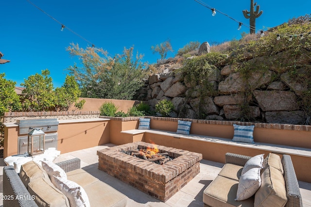 11070 E Bent Tree Dr, Scottsdale, AZ 85262 - view of patio / terrace with an outdoor fire pit and area for grilling