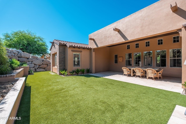 11070 E Bent Tree Dr, Scottsdale, AZ 85262 - rear view of property featuring stucco siding, a yard, a patio, a tiled roof, and stone siding