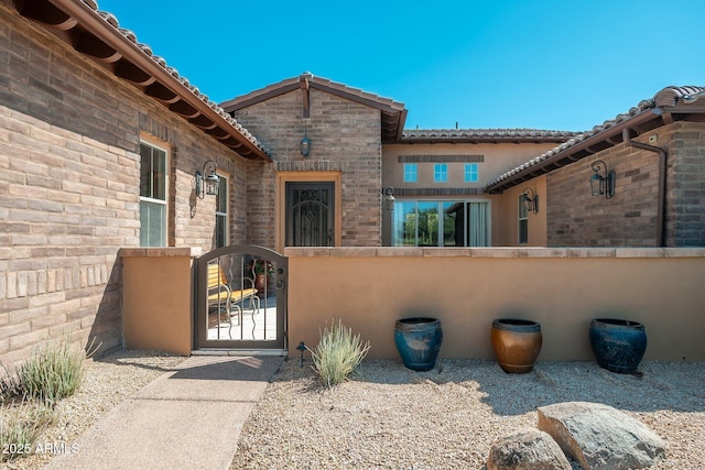 11070 E Bent Tree Dr, Scottsdale, AZ 85262 - property entrance with a gate and stucco siding