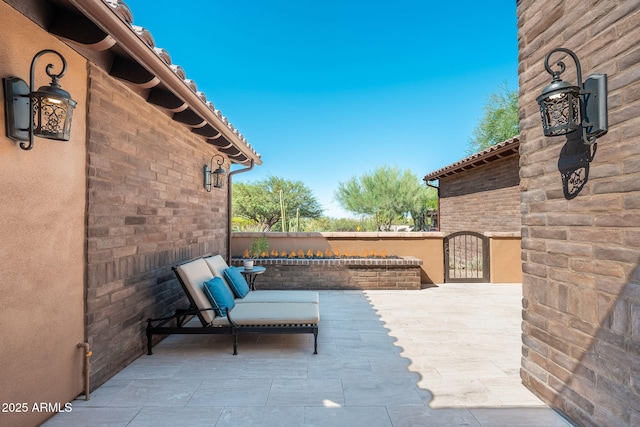 11070 E Bent Tree Dr, Scottsdale, AZ 85262 - view of patio / terrace featuring a gate