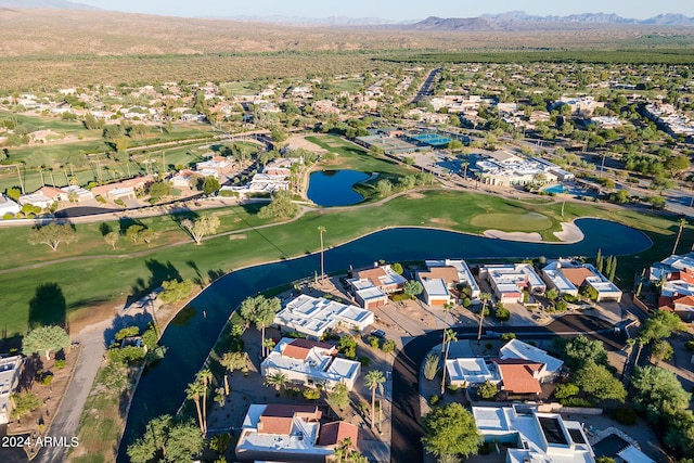 bird's eye view with a residential view, golf course view, and a water and mountain view