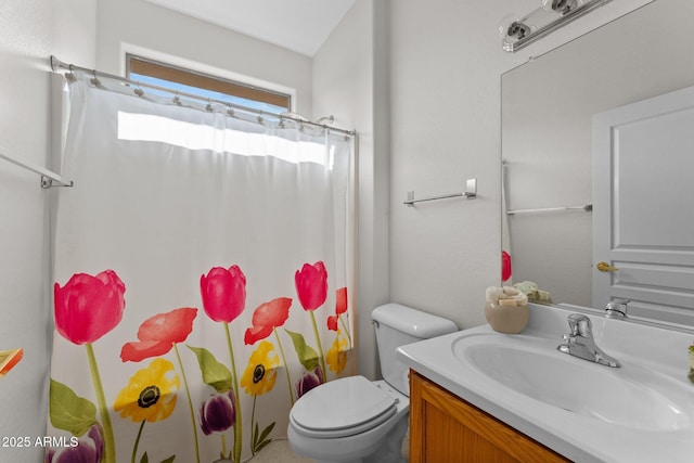 bathroom with shower / bath combo with shower curtain, toilet, and vanity