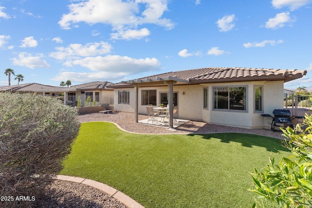 back of property featuring a patio, fence, a tile roof, and stucco siding