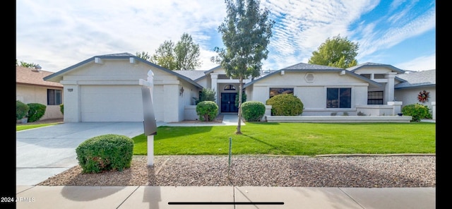 single story home featuring a garage and a front lawn