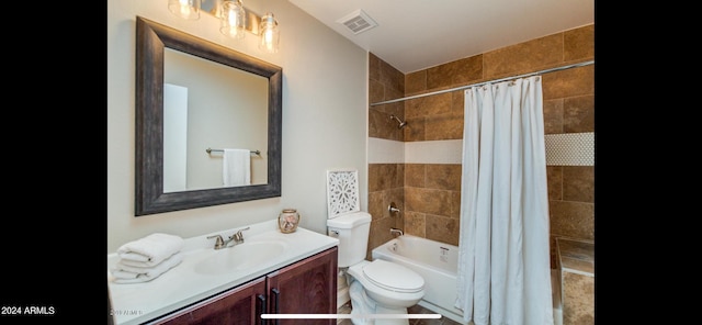 full bathroom with vanity, toilet, and shower / bath combo