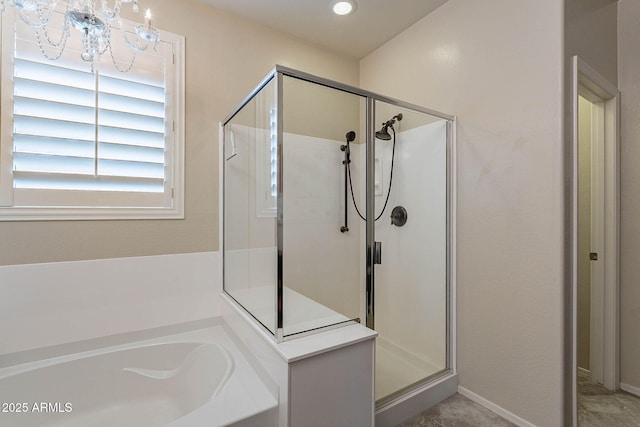 bathroom featuring plus walk in shower