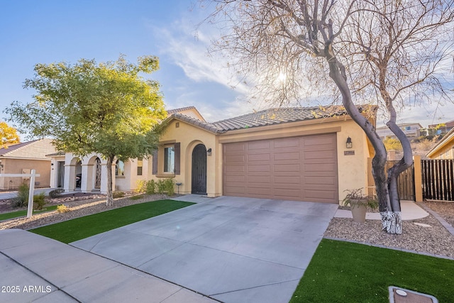 view of front of property with a garage