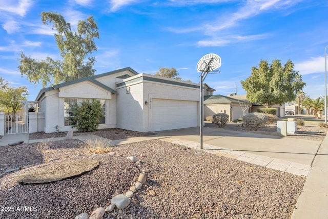 single story home featuring a garage