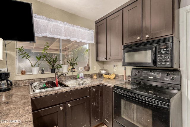 kitchen with sink, dark brown cabinets, and black appliances