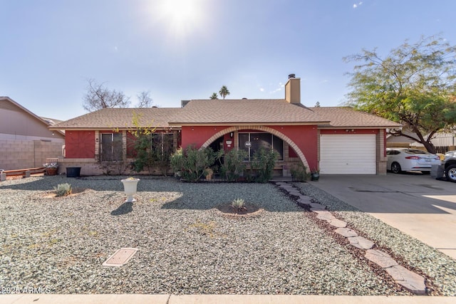 ranch-style house with a garage