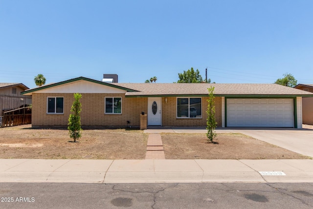 3539 W Davidson Ln, Phoenix, AZ 85051 - ranch-style house featuring driveway and an attached garage