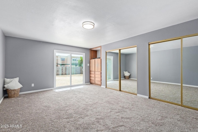 3539 W Davidson Ln, Phoenix, AZ 85051 - unfurnished bedroom with multiple closets, carpet, and access to outside
