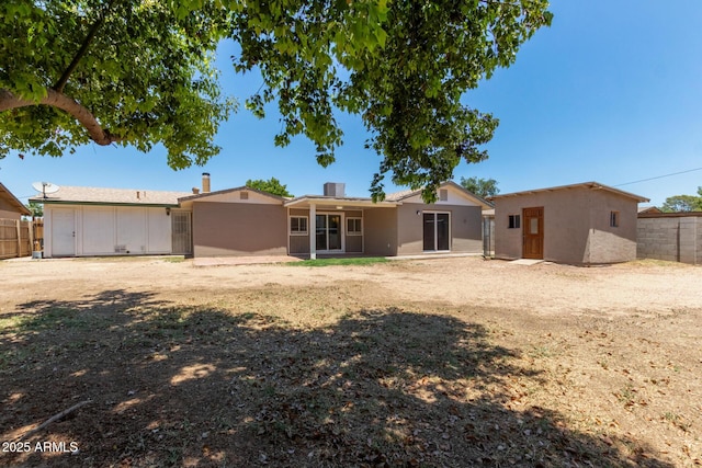 3539 W Davidson Ln, Phoenix, AZ 85051 - rear view of property featuring stucco siding