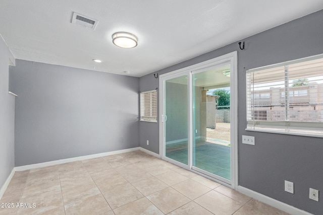 3539 W Davidson Ln, Phoenix, AZ 85051 - empty room with light tile patterned floors