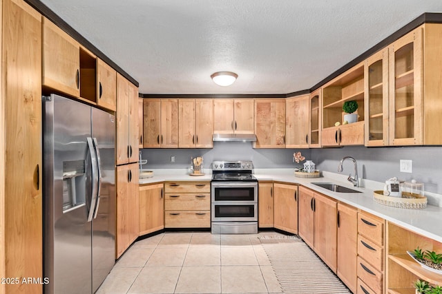 3539 W Davidson Ln, Phoenix, AZ 85051 - kitchen with stainless steel appliances, open shelves, under cabinet range hood, light countertops, and a textured ceiling