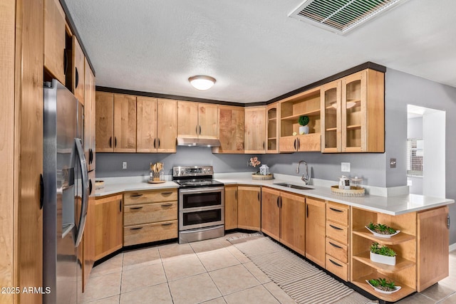 3539 W Davidson Ln, Phoenix, AZ 85051 - kitchen featuring stainless steel appliances, under cabinet range hood, open shelves, light countertops, and light tile patterned floors