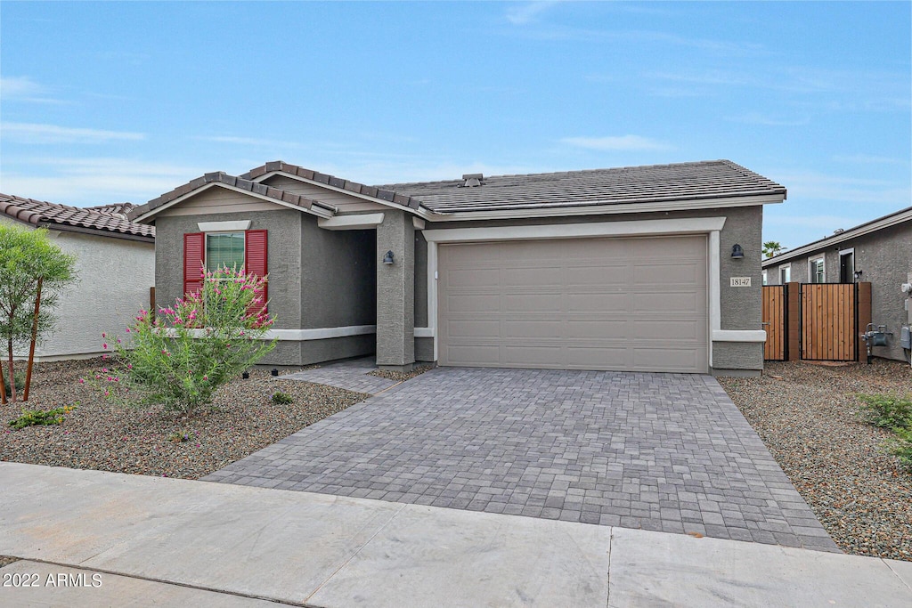 view of front of home with a garage