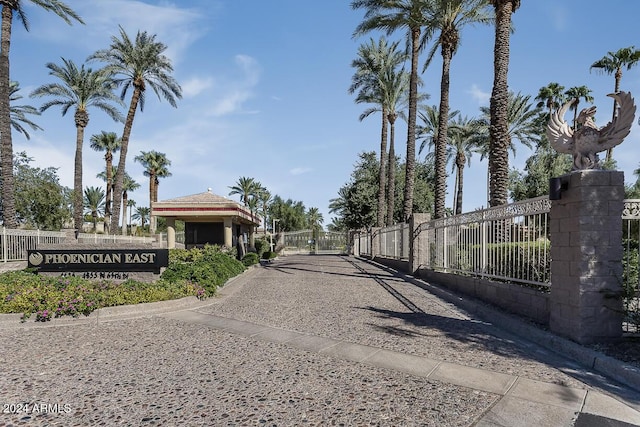 4710 N 65th St, Scottsdale, AZ 85251 - view of street featuring curbs, a gated entry, and a gate