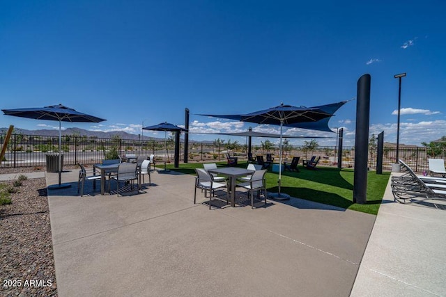 view of patio / terrace with a mountain view