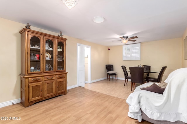 4046 E Crocus Dr, Phoenix, AZ 85032 - living area featuring ceiling fan and light wood-style flooring