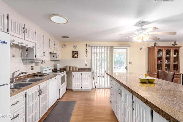4046 E Crocus Dr, Phoenix, AZ 85032 - kitchen featuring white appliances, ceiling fan, white cabinetry, tasteful backsplash, and light wood-type flooring