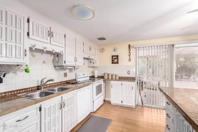 4046 E Crocus Dr, Phoenix, AZ 85032 - kitchen featuring white appliances, light wood finished floors, decorative backsplash, white cabinets, and tile countertops