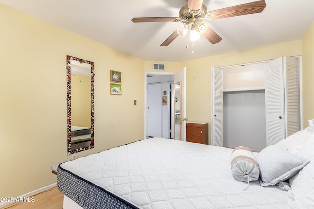 4046 E Crocus Dr, Phoenix, AZ 85032 - bedroom featuring wood finished floors, a ceiling fan, and a closet
