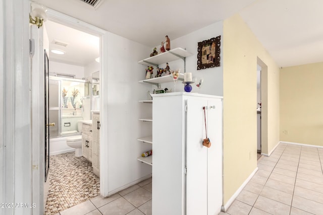 4046 E Crocus Dr, Phoenix, AZ 85032 - corridor with light tile patterned floors