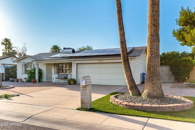 4046 E Crocus Dr, Phoenix, AZ 85032 - single story home with an attached garage, solar panels, concrete driveway, and a porch