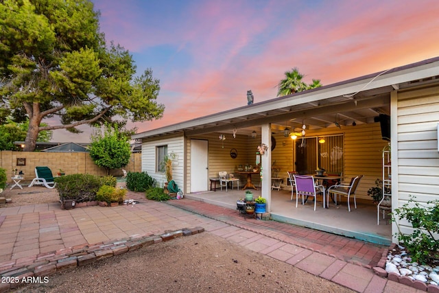 4046 E Crocus Dr, Phoenix, AZ 85032 - patio terrace at dusk with a patio area and outdoor dining area