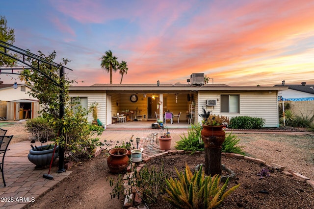 4046 E Crocus Dr, Phoenix, AZ 85032 - back of house with a patio area