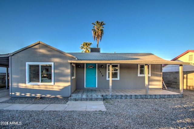 11014 W Cocopah St, Avondale, AZ 85323 - view of front of house featuring a porch and roof with shingles