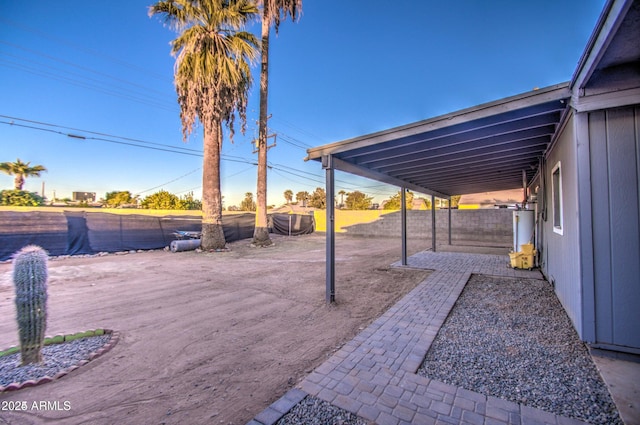 11014 W Cocopah St, Avondale, AZ 85323 - fenced backyard featuring a patio and gas water heater