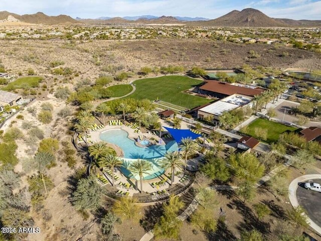 drone / aerial view featuring a mountain view