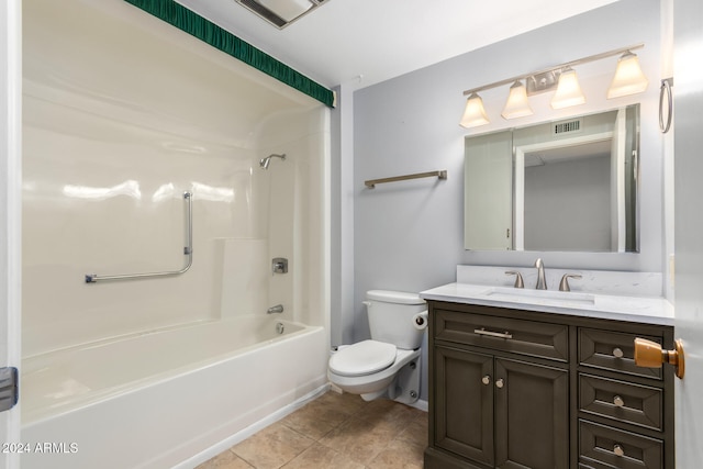 full bathroom with vanity, tile patterned flooring, washtub / shower combination, and toilet