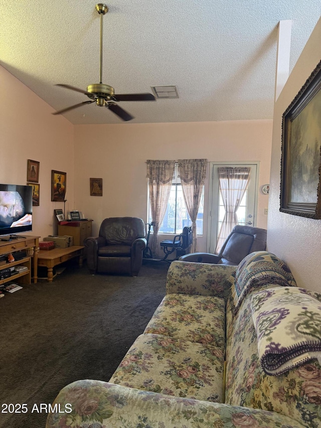 5430 N 74th Ave, Glendale, AZ 85303 - carpeted living room with a ceiling fan, a textured ceiling, and visible vents