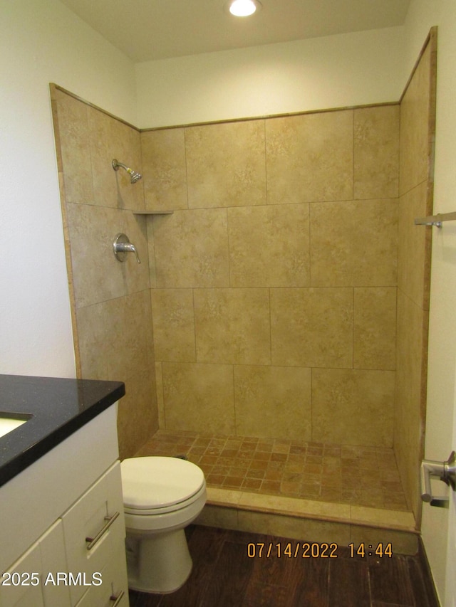 327 E Ln Jolla Dr, Tempe, AZ 85282 - full bath with vanity, toilet, a tile shower, recessed lighting, and wood finished floors