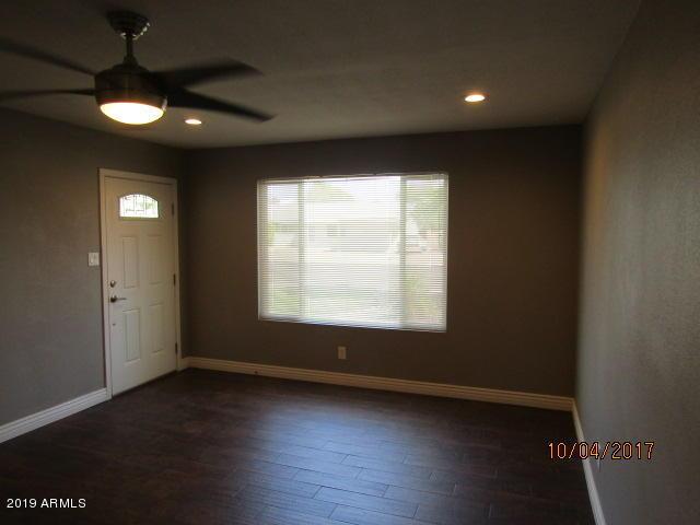 327 E Ln Jolla Dr, Tempe, AZ 85282 - entrance foyer with a ceiling fan, baseboards, dark wood-type flooring, and recessed lighting