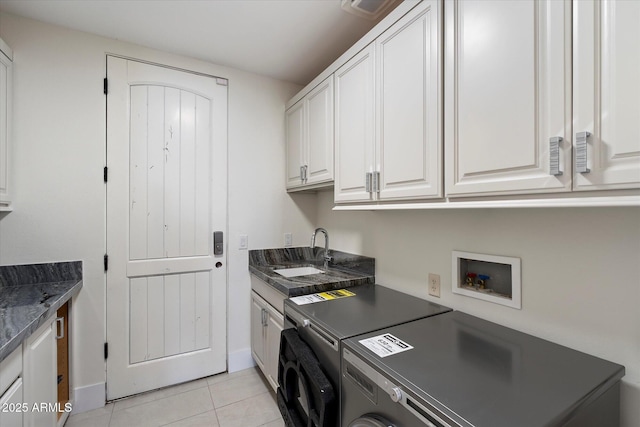 29215 N 136th St, Scottsdale, AZ 85262 - laundry room with washer / clothes dryer, cabinet space, and light tile patterned floors