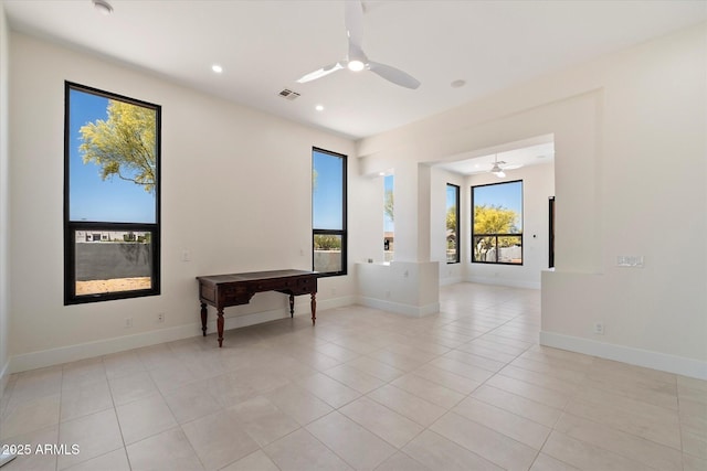 29215 N 136th St, Scottsdale, AZ 85262 - spare room with a ceiling fan, light tile patterned flooring, recessed lighting, and baseboards